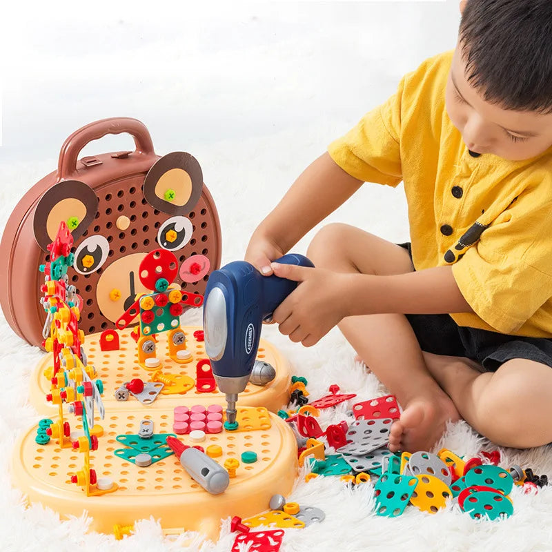 a boy is fixing the play toolbox